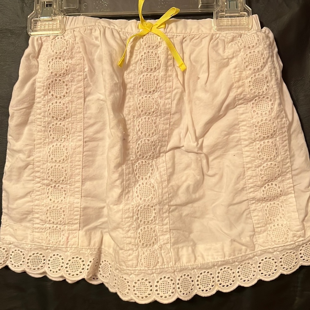 Lot of 2 pieces. Lace eyelet skirt and child’s small t-shirt